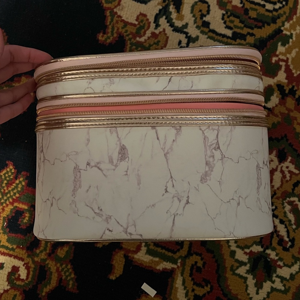 Pink and white travel makeup bag